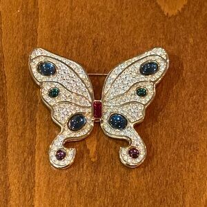 Pave crystal butterfly pin marked “S.A.L.” by SWAROVSKI. Cabochons on wings.